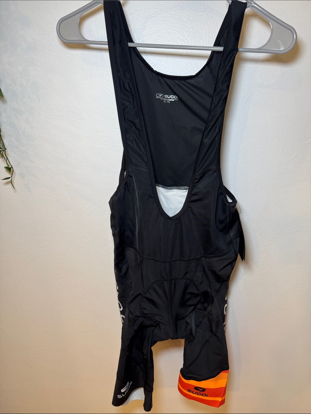 SUGOI RS Pro Short men’s black Cycling One-Piece Bib with Orange Stripe XL NWT